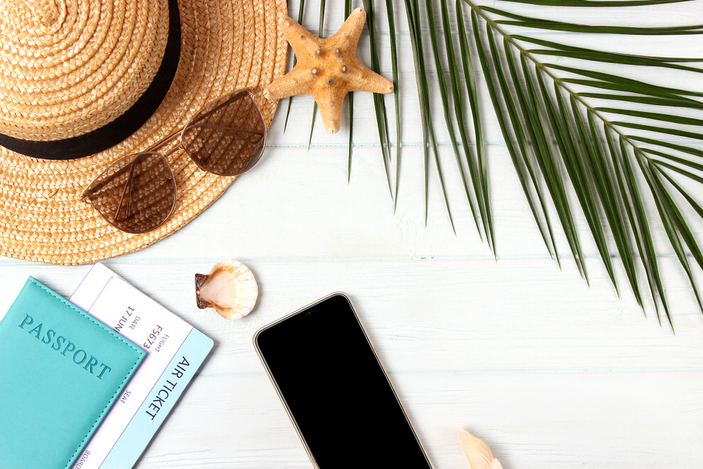 Travel accessories, passport, sunglasses, phone